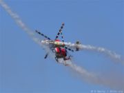 HAL Dhruv helicopters of the Indian Air Force Sarang aerobatics team.